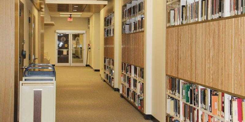 library hallway with book lines shelves to the right